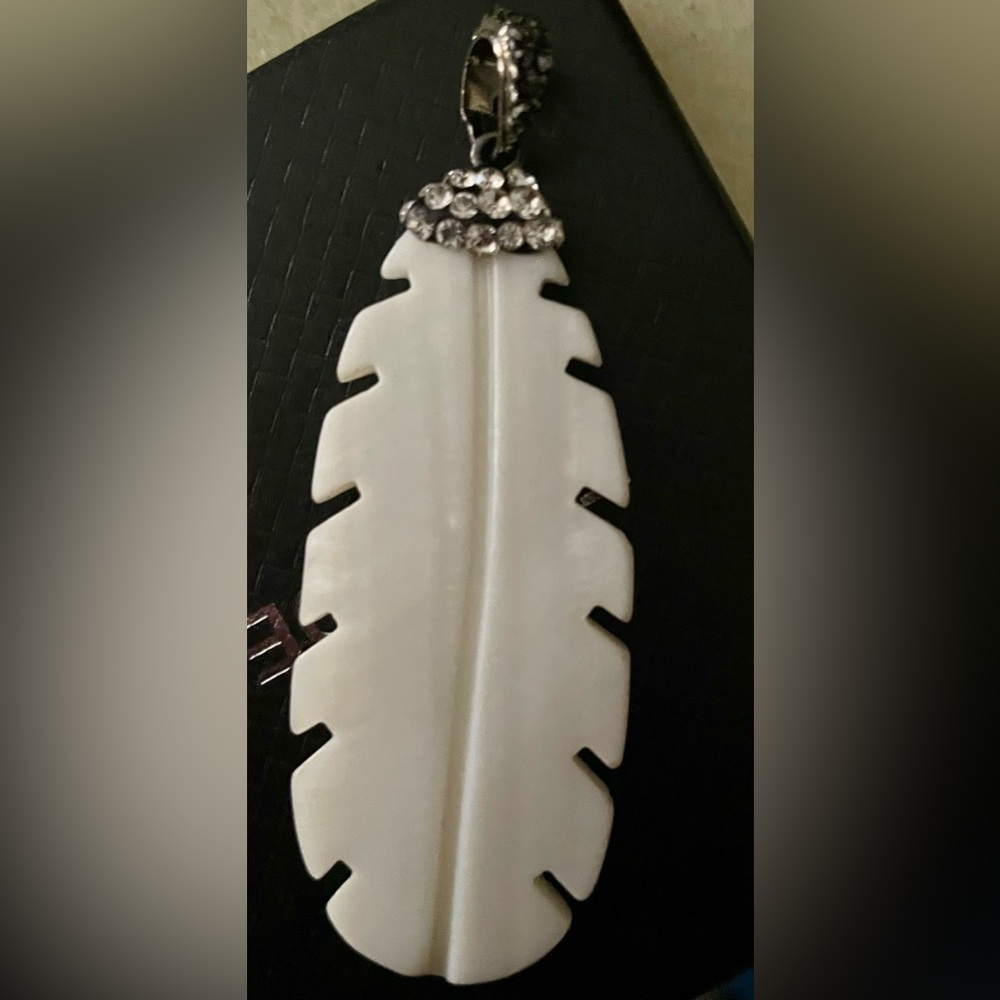 Beautiful mother of pearl feather pendant with rhinestones